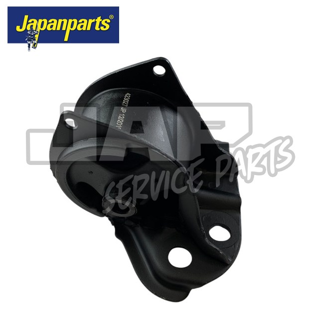 Black metal car engine mounting bracket with two large bolt holes, displayed on a white background. Japanparts logo is in the top left corner, and JAP Service Parts is watermarked across the image. | Jap Service Parts - Car Parts