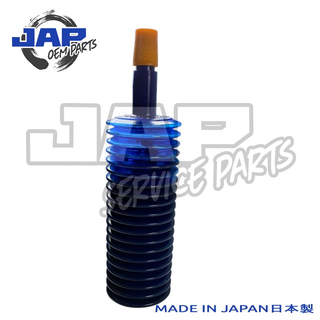 A blue automotive shock absorber gaiter with a ridged design and an orange cap, displayed on a white background with JAP OEM PARTS and MADE IN JAPAN text overlays. | Jap Service Parts - Car Parts