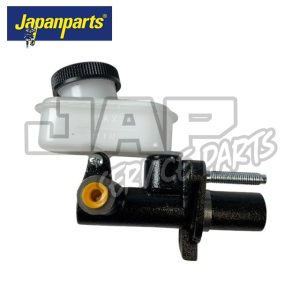 A black and white automotive master cylinder with a plastic reservoir and cap, featuring a yellow port and a threaded metal rod, displayed on a white background with the Japanparts logo in the top left corner. | Jap Service Parts - Car Parts