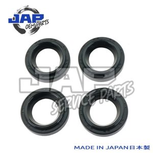 Four black rubber oil seals are arranged in a square pattern on a white background. The logo JAP OEM PARTS and the text MADE IN JAPAN 日本製 appear on the image. | Jap Service Parts - Car Parts