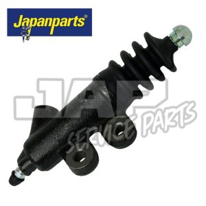 A black automotive part, likely a hydraulic clutch or brake cylinder, with a rubber gaiter and mounting points. The Japanparts logo is in the top left corner on a blue and yellow background. | Jap Service Parts - Car Parts