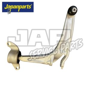 A metallic car suspension control arm with three mounting points, displayed on a white background. The Japanparts logo appears in the top left corner. | Jap Service Parts - Car Parts