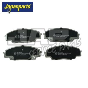 Four black and silver automotive brake pads are shown arranged in two rows. The Japanparts logo is at the top left corner, and Service Parts is written in large, grey translucent text across the image. | Jap Service Parts - Car Parts