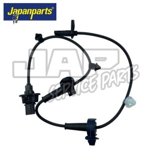 A black ABS wheel speed sensor with connectors and mounting clips, displayed on a white background. The Japanparts logo is in the top left corner and JAP SERVICE PARTS watermark is in the background. | Jap Service Parts - Car Parts