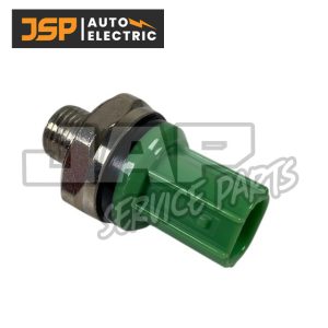 A green and silver automotive electrical sensor with a threaded metal end and plastic connector, shown on a white background. The JSP Auto Electric logo is in the top left corner. | Jap Service Parts - Car Parts