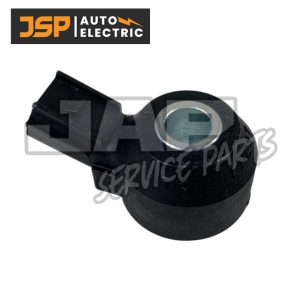 A black automotive sensor part with a metal centre hole, displayed on a white background. The top left corner has a JSP Auto Electric logo, and a faint JAP Service Parts watermark overlays the image. | Jap Service Parts - Car Parts