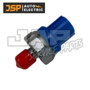 A blue and silver automotive sensor with a red protective cap, displayed on a white background. The JSP Auto Electric logo is in the top left corner, and a watermark reads JAP Service Parts. | Jap Service Parts - Car Parts