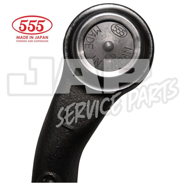 Close-up of a black suspension part with a round metal end, marked 555 MADE IN JAPAN. A red 555 logo and JAP SERVICE PARTS watermark are also visible. | Jap Service Parts - Car Parts