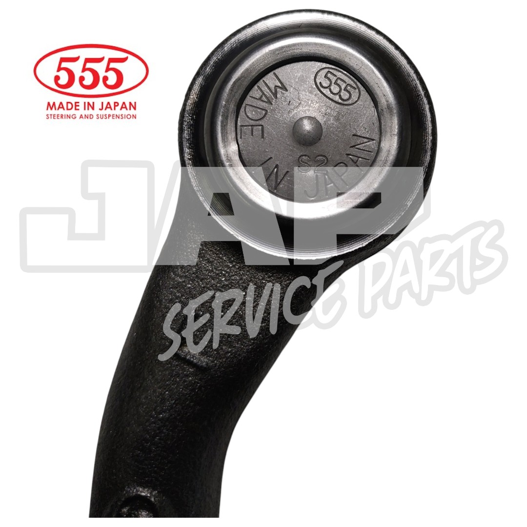 Close-up of a black suspension part with a round metal end, marked 555 MADE IN JAPAN. A red 555 logo and JAP SERVICE PARTS watermark are also visible. | Jap Service Parts - Car Parts