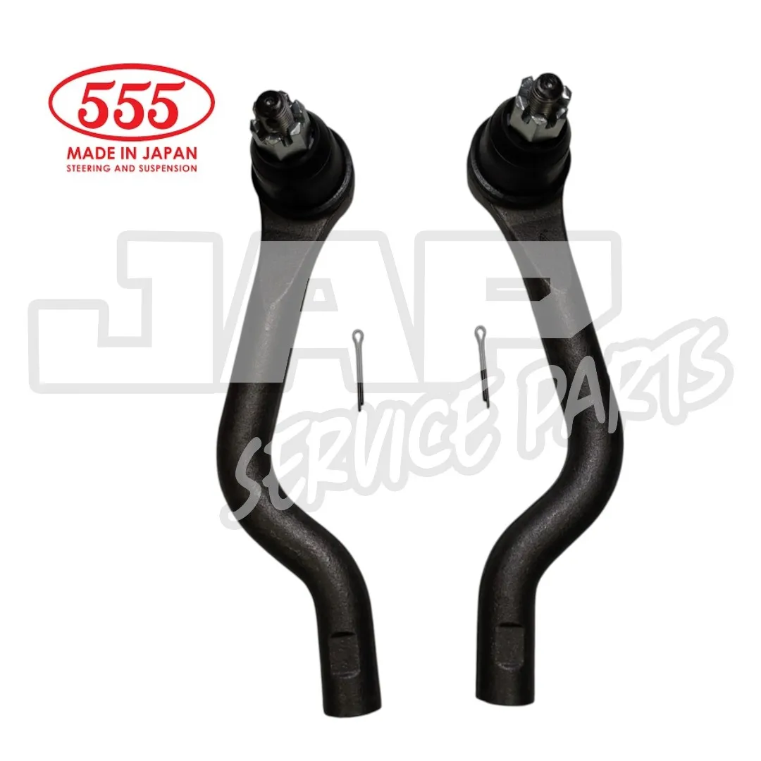 Two black suspension steering parts, with metal pins, labelled 555 Made in Japan in red; the background features faint JAP Service Parts text in grey. | Jap Service Parts - Car Parts
