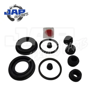 Various black rubber seals and rings, plus a small packet of red grease, arranged on a white background with JAP OEM PARTS logo in the top left corner. | Jap Service Parts - Car Parts
