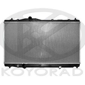 A silver car radiator with thin, vertical cooling fins and black plastic end tanks, viewed from the front. The Koyorad logo is faintly visible in the background. | Jap Service Parts - Car Parts